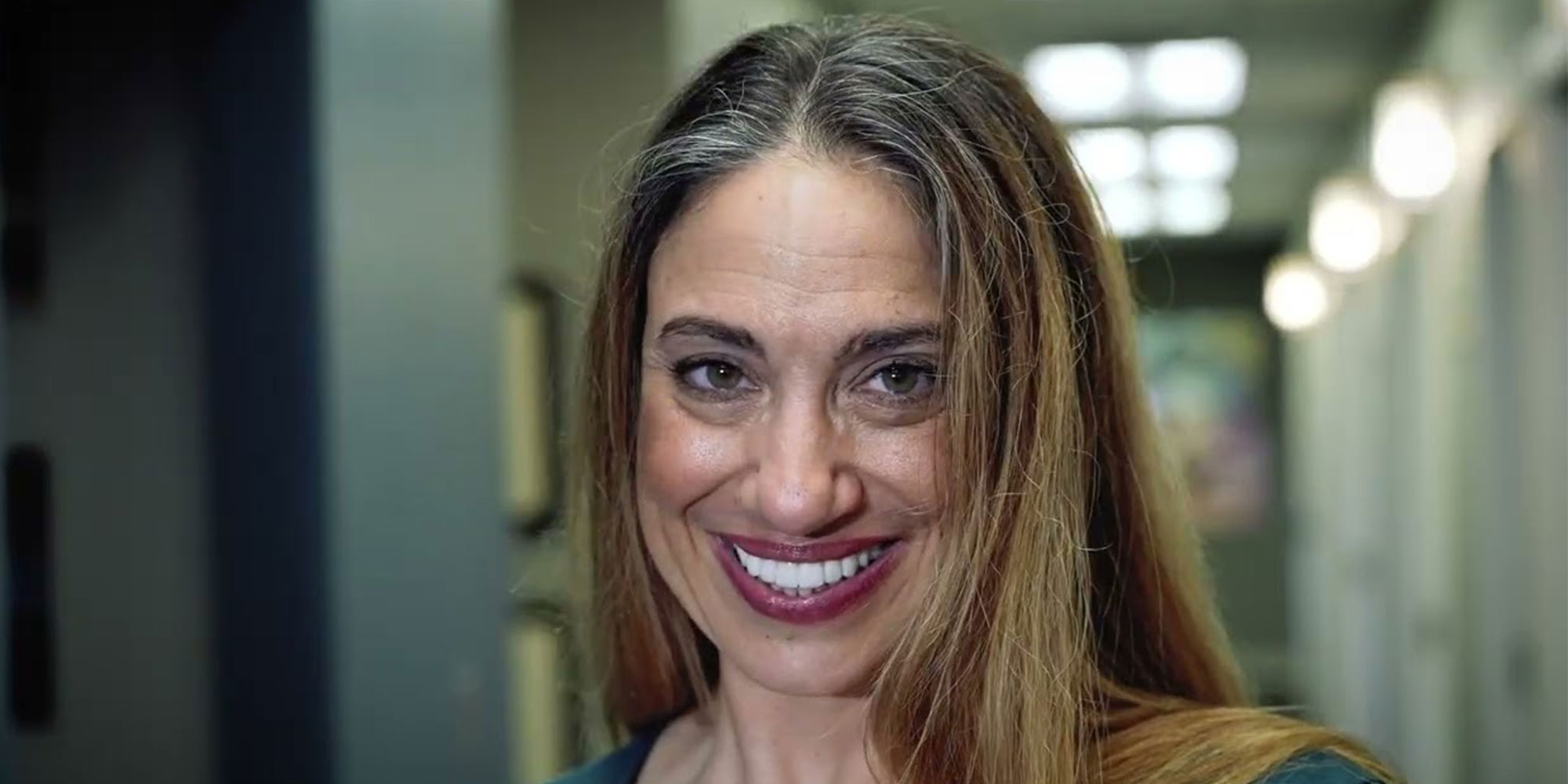 Alicia, a patient, smiling