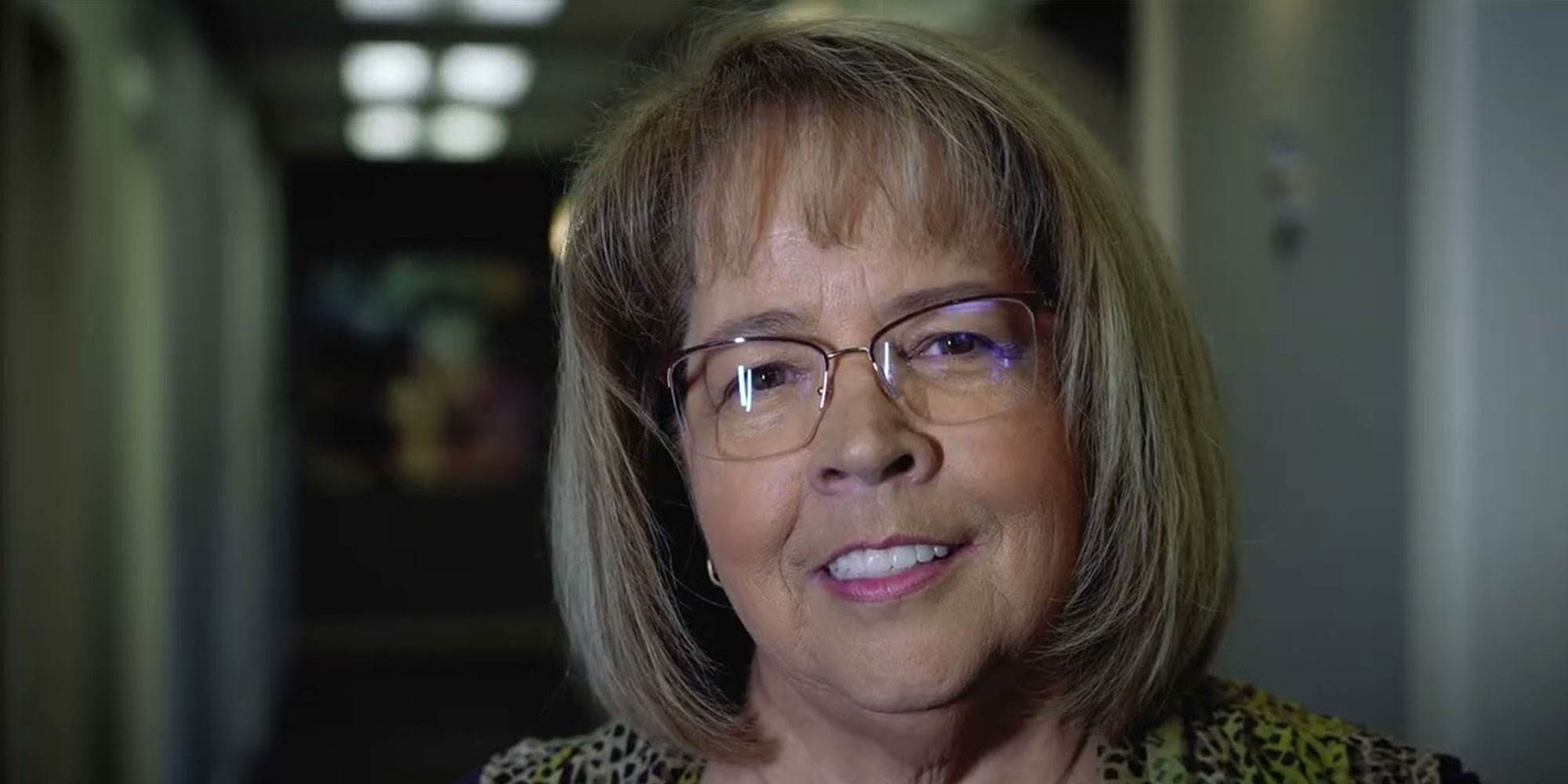 Cathy, a patient, smiling